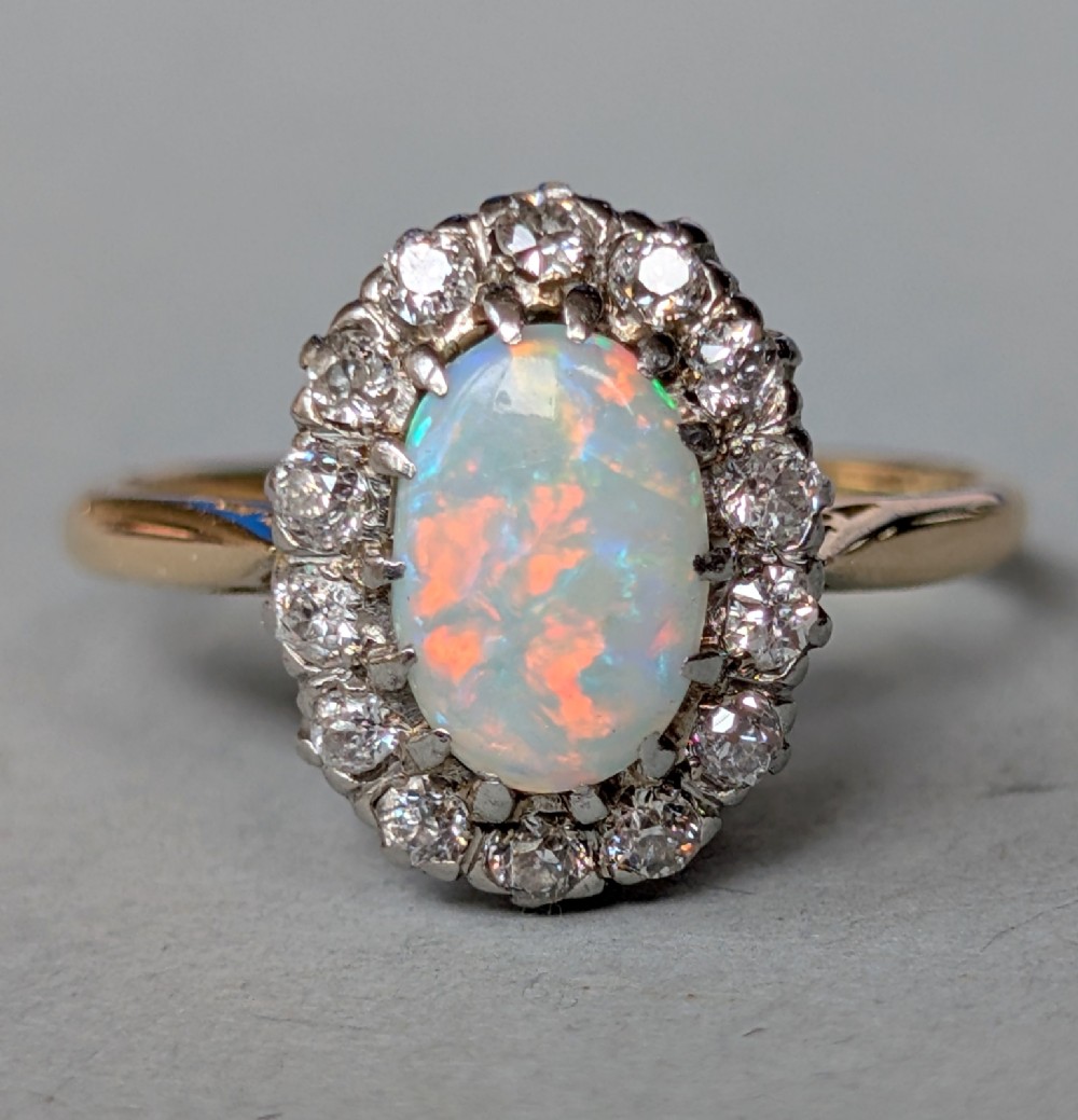 Mid 20th century 18ct gold platinum diamond opal ring