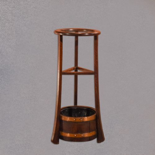 fig 1. Edwardian Oak Stick Stand, R.A. Lister & Co, c.1910