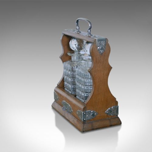 fig 1. Antique Tantalus, Pair of Decanters, Oak Victorian