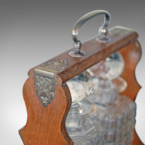 fig 2. Antique Tantalus, Pair of Decanters, Oak Victorian