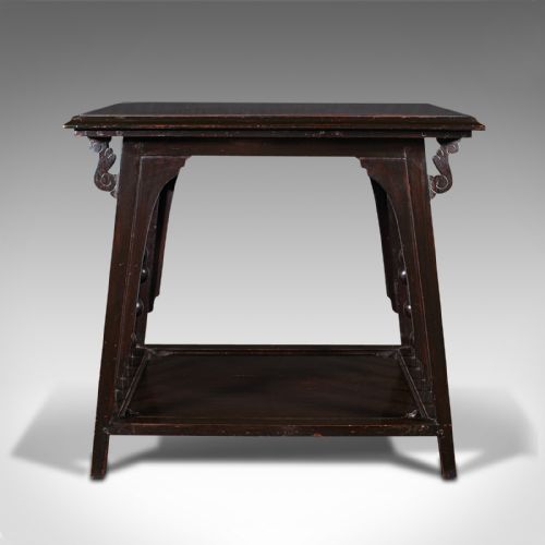 fig 1. An Aesthetic Movement ebonised wood two-tier side table featuring side galleries set with turned wooden spheres.