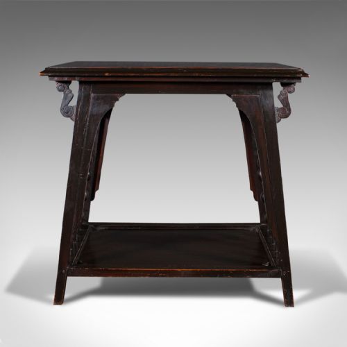 fig 3. An Aesthetic Movement ebonised wood two-tier side table featuring side galleries set with turned wooden spheres.