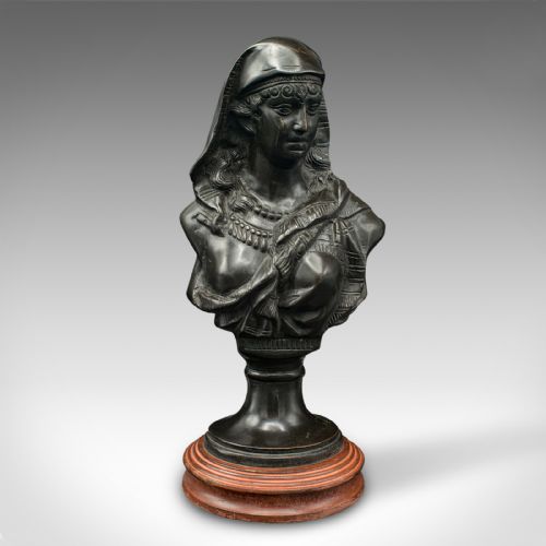 fig 1. A dark patinated French bronze portrait bust of a veiled woman wearing detailed drapery, set on a turned wooden base.