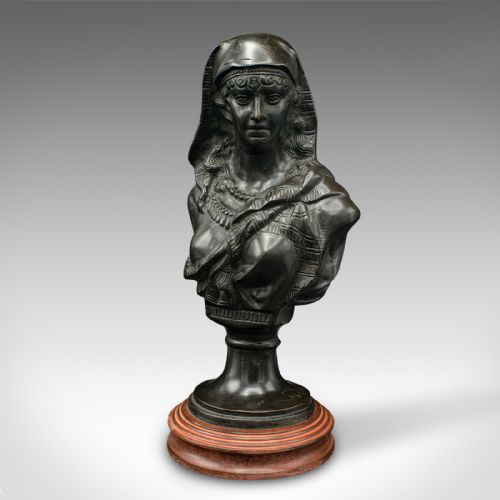 fig 2. A dark patinated French bronze portrait bust of a veiled woman wearing detailed drapery, set on a turned wooden base.