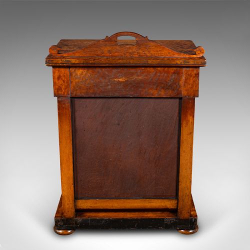 fig 6. An antique burr maple writing desk featuring a scrolled back gallery, a pull-out drawer with a red leather inset skiver, turned column supports, and a shaped plinth base.