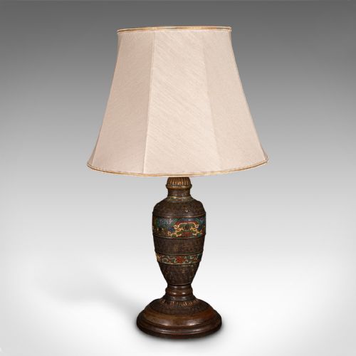 fig 1. An antique Japanese dark bronze vase-shaped table lamp featuring polychrome cloisonne enamel bands and fitted with a cream fabric shade.
