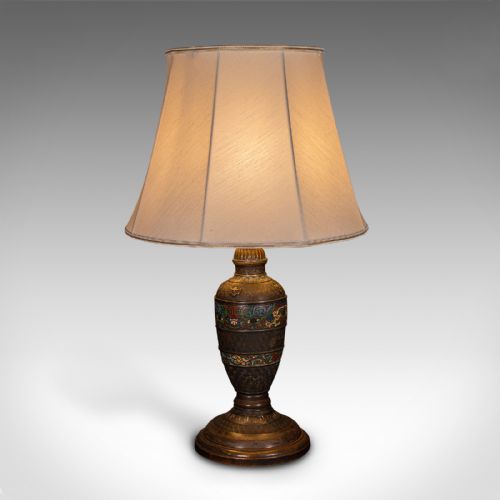 fig 2. An antique Japanese dark bronze vase-shaped table lamp featuring polychrome cloisonne enamel bands and fitted with a cream fabric shade.