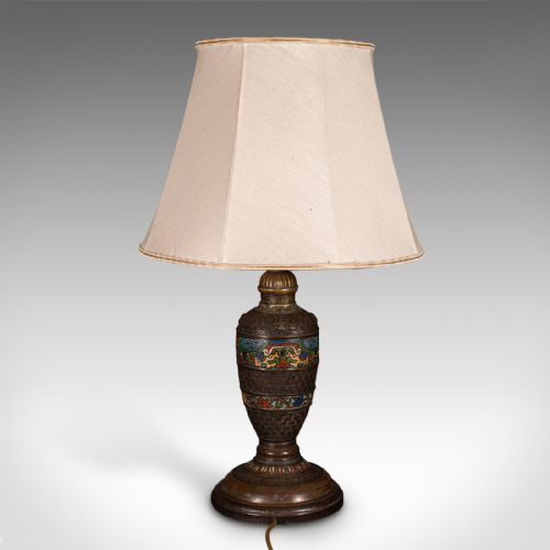 fig 4. An antique Japanese bronze and cloisonne table lamp with colourful enamelled geometric bands and a light beige fabric shade.