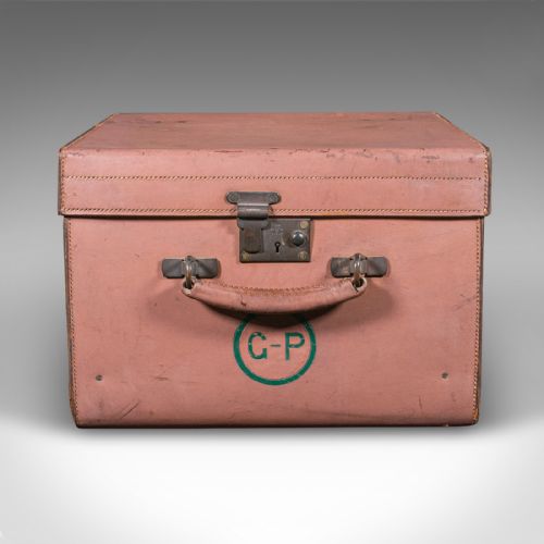 fig 2. An open antique tan brown leather picnic case with a bright green lined interior, internal straps, brass locking mechanism, and a single carrying handle.