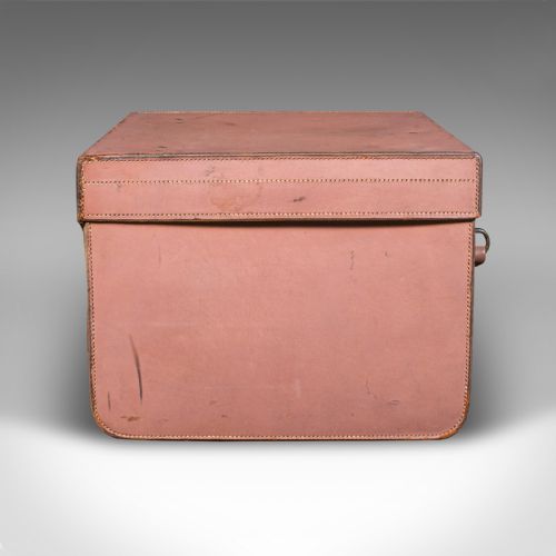 fig 4. An open antique tan brown leather picnic case with a bright green lined interior, internal straps, brass locking mechanism, and a single carrying handle.