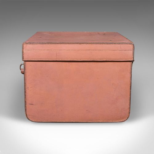 fig 5. An open antique tan brown leather picnic case with a bright green lined interior, internal straps, brass locking mechanism, and a single carrying handle.