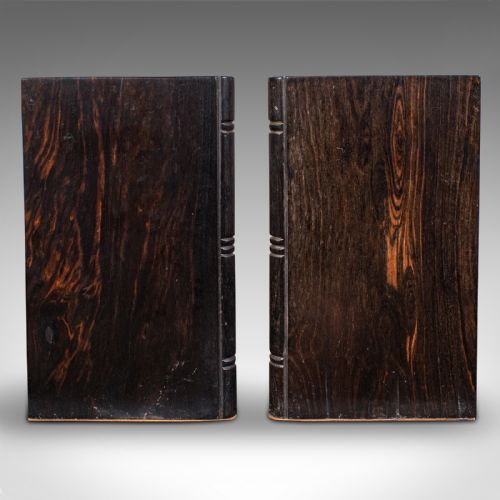 fig 4. Pair of Victorian Anglo-Indian coromandel wood bookends featuring carved elephant figures with bone tusks on L-shaped bases.