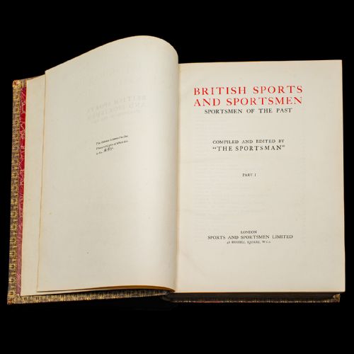 fig 2. A two-volume set of antique red leather-bound books titled British Sports and Sportsmen with gilt lettering and raised spine bands.