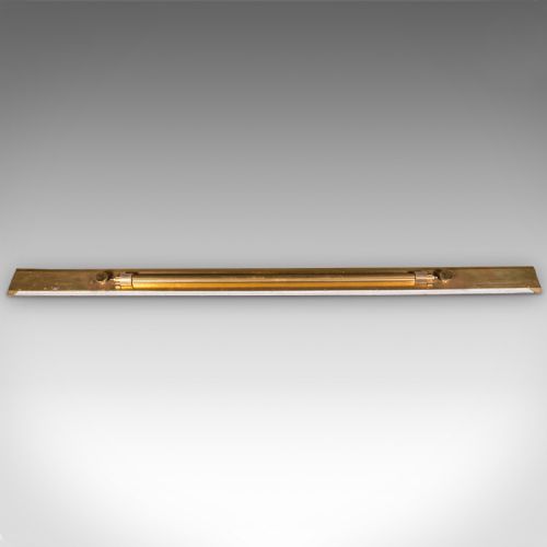 fig 1. An Edwardian antique brass rolling parallel ruler shown alongside its fitted rectangular wooden storage box.