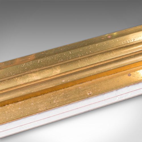 fig 4. An Edwardian antique brass rolling parallel ruler shown alongside its fitted rectangular wooden storage box.