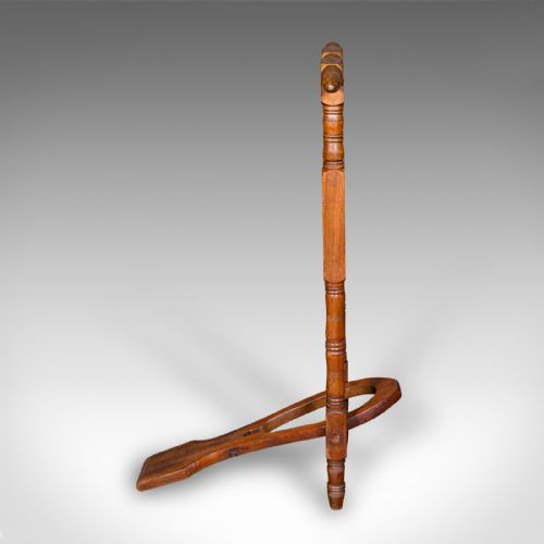 fig 2. A Victorian turned walnut folding standing boot jack with a top hand grip and a u-shaped heel cutout.