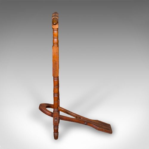 fig 3. A Victorian turned walnut folding standing boot jack with a top hand grip and a u-shaped heel cutout.