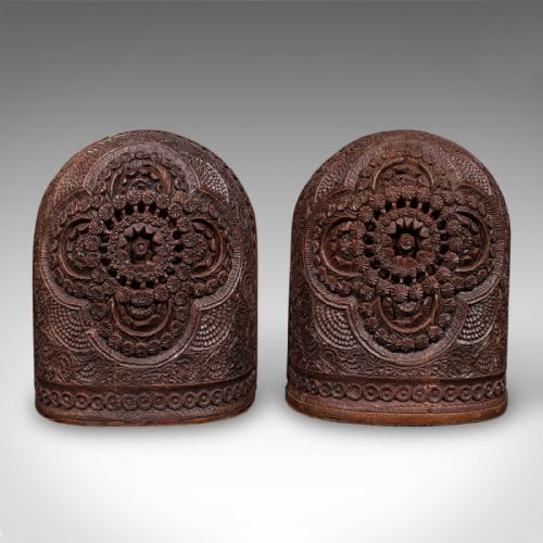 fig 2. A pair of arch-topped antique beech wood bookends decorated with intricate foliate and floral relief carvings.