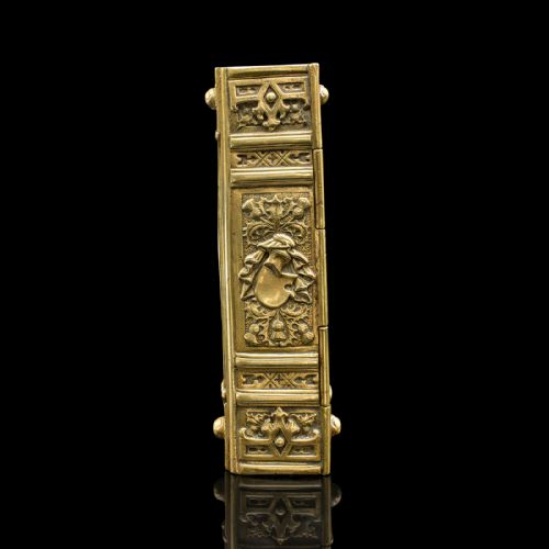 fig 3. An ornate Victorian cast brass keepsake box fashioned in the shape of a book, featuring relief floral and thistle motifs with corner bosses.