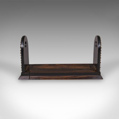 fig 2. An antique Regency coromandel wood extending book slide featuring mother-of-pearl inlay and brass stud detailing on folding arched ends.