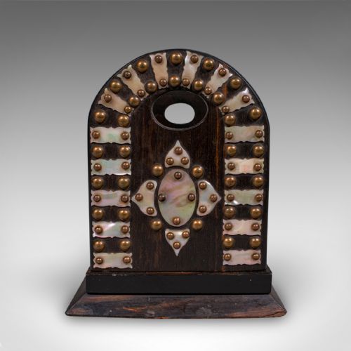 fig 3. An antique Regency coromandel wood extending book slide featuring mother-of-pearl inlay and brass stud detailing on folding arched ends.