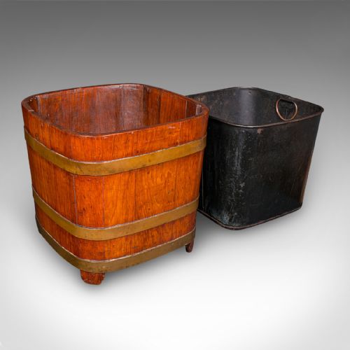 fig 1. A square warm brown wooden coal bucket featuring brass binding bands and an internal black metal liner.