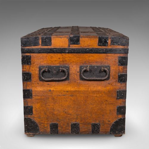 fig 3. A large Victorian oak silver chest reinforced with heavy black iron straps, riveted corner brackets, side handles, and a central brass plate.