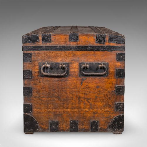 fig 5. A large Victorian oak silver chest reinforced with heavy black iron straps, riveted corner brackets, side handles, and a central brass plate.