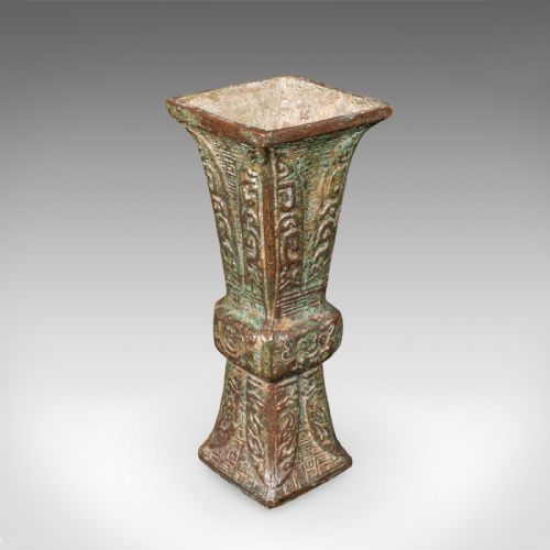 fig 1. An antique cast bronze Gu ritual vessel featuring a flared rim, central raised knop, archaic relief carving, and verdigris patinated finish.