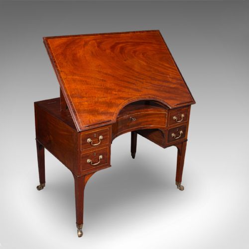 fig 1. A Regency mahogany metamorphic architects desk featuring an adjustable tilted top on ratchet risers above a kneehole drawer base with brass handles.