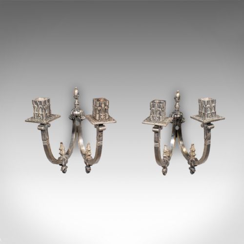 fig 1. A pair of antique French silvered metal twin-branch candle sconces with fleur-de-lis detailing and square sockets.