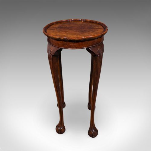 fig 3. An Edwardian burr walnut oval side table featuring a raised pie crust edge and carved cabriole legs.
