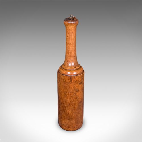 fig 1. A turned beechwood steak tenderiser with a tapered handle and smooth cylindrical head, featuring a warm brown patina.