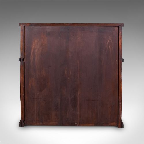 fig 3. A Victorian mahogany two-tier open campaign folio bookcase featuring brass side carrying handles and a stepped upper shelf.