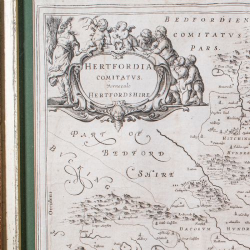 fig 4. A framed seventeenth-century monochrome copperplate engraved map of Hertfordshire by Joan Blaeu, set within a dark oak frame with a green mount.