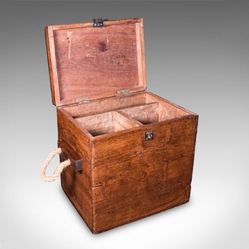 fig 1. A Georgian walnut maritime decanter box featuring side rope handles and an iron front latch.