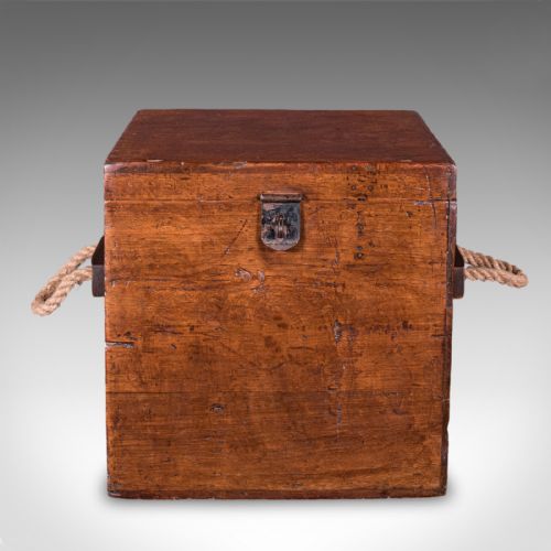 fig 2. A Georgian walnut maritime decanter box featuring side rope handles and an iron front latch.
