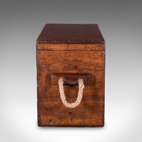 fig 3. A Georgian walnut maritime decanter box featuring side rope handles and an iron front latch.
