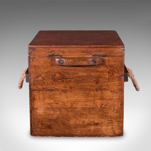 fig 4. A Georgian walnut maritime decanter box featuring side rope handles and an iron front latch.