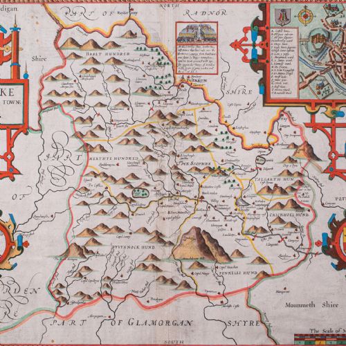 fig 3. A framed seventeenth-century hand-coloured map of Breconshire by John Speed set within a dark ebonised frame with a gilded inner rim.