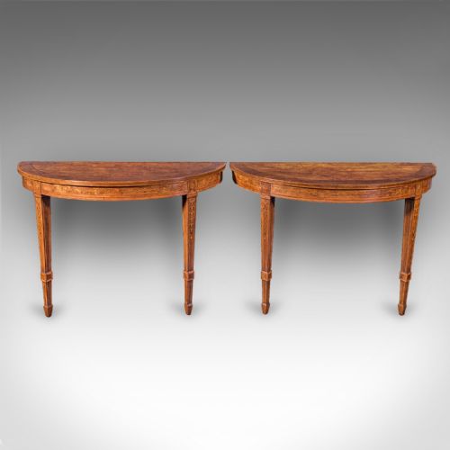 fig 1. A pair of Georgian Neoclassical demi-lune side tables crafted from golden wood with inlaid bandings and tapered square legs.