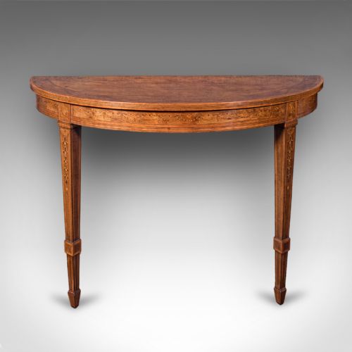 fig 2. A pair of Georgian Neoclassical demi-lune side tables crafted from golden wood with inlaid bandings and tapered square legs.