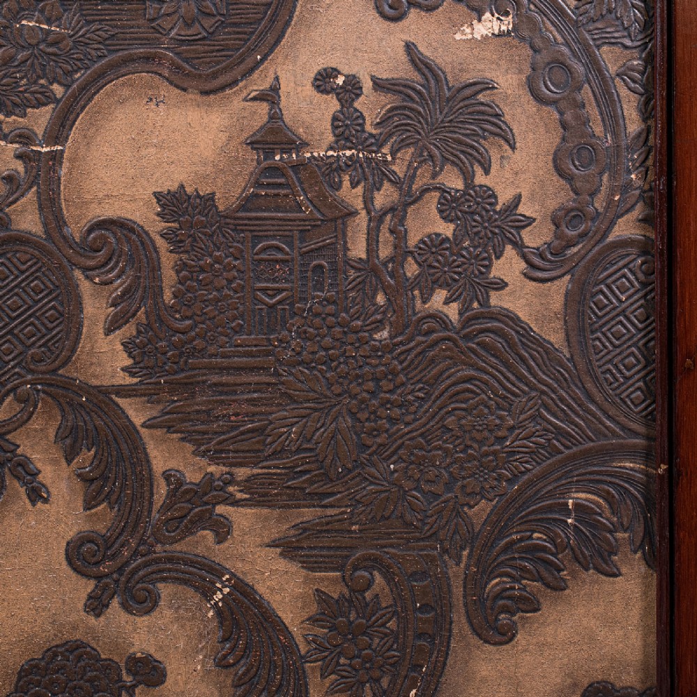 A four-panel mahogany folding room divider featuring patterned chinoiserie canvas panels set within dark wood frames. View IX