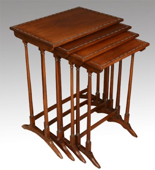Nest of Four Mahogany Tables