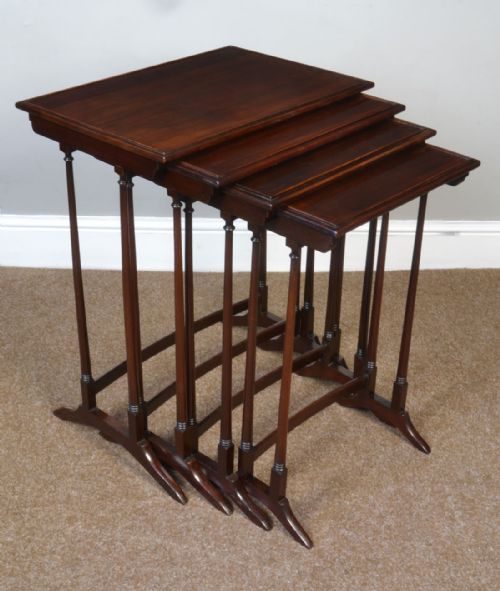 Nest of Four Mahogany Tables