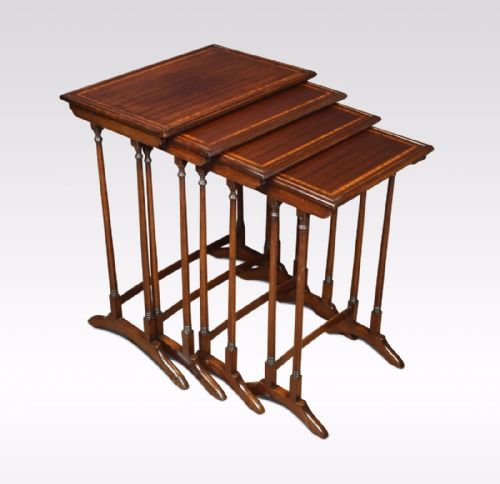 Nest of Four Mahogany Inlaid Tables