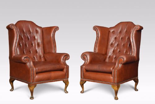 Pair of Leather Upholstered Wingback Armchairs