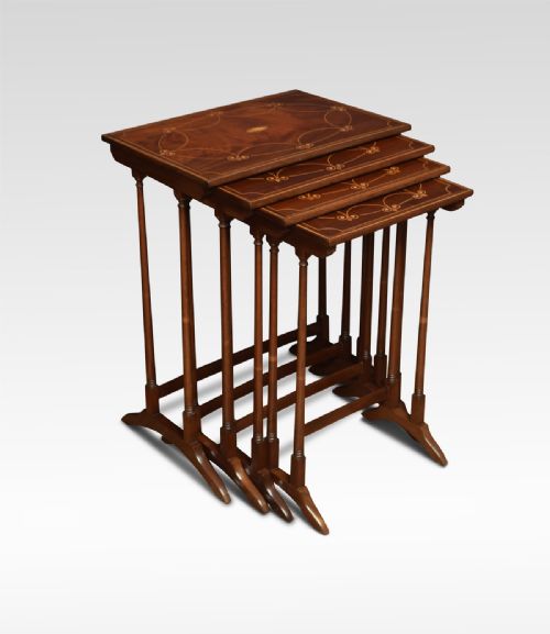 Nest of Four Mahogany Inlaid Tables