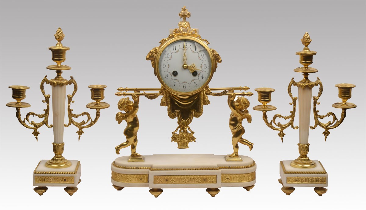 White marble clock with garnitures