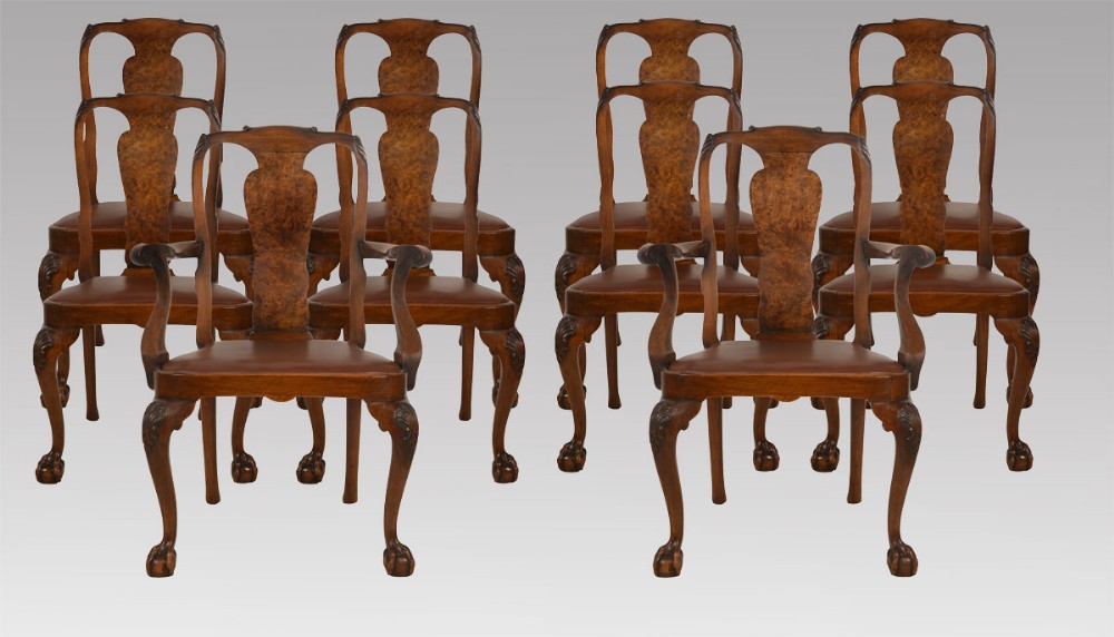 Set of ten walnut George II style dining chairs